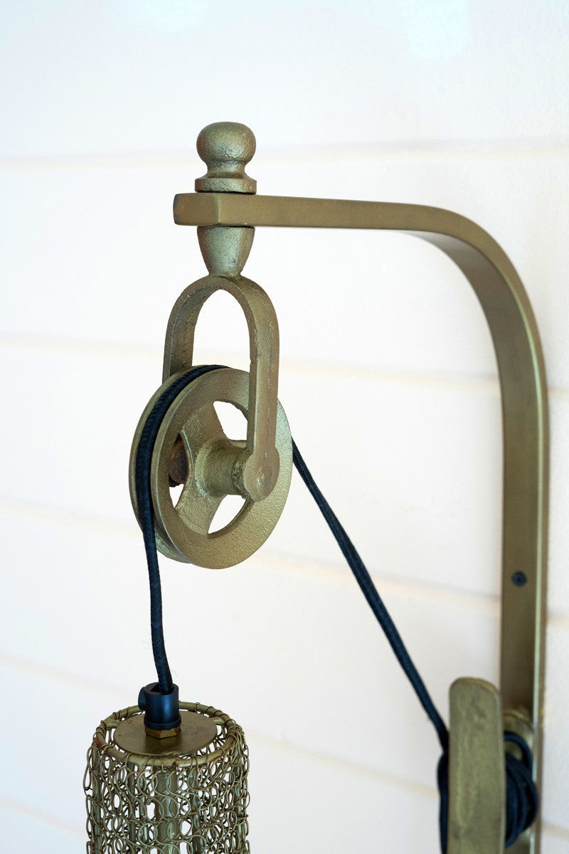 Antiqued Brass Pulley Wall Lamp with Wire Brass Shade
