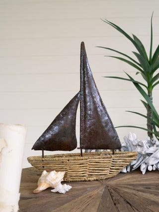 Seagrass Boat with Rustic Hand-Hammered Metal Sail
