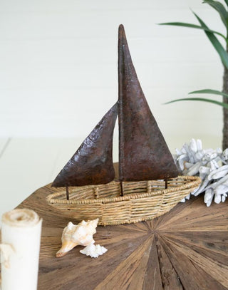 Seagrass Boat with Rustic Hand-Hammered Metal Sail